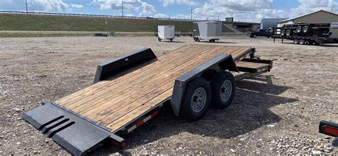 loading skid steer on tilt trailer|deck over tilt flatbed trailers.